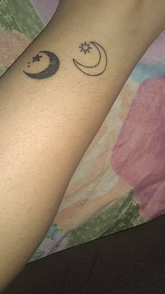 Filled and non-filled moon tattoo with stars