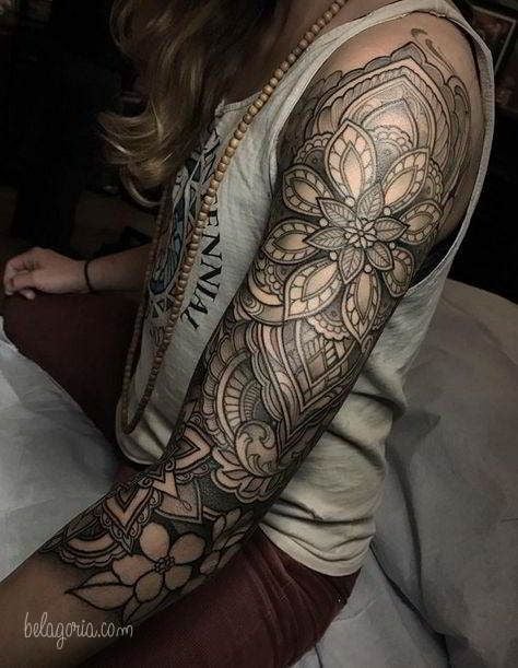 Sleeve tattoo beautiful flower patterns and geometric drawings