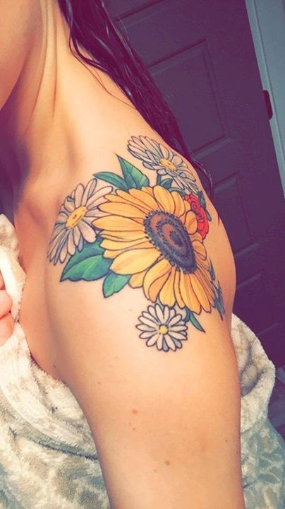 Tattoo on the Shoulder Woman Sunflower Flowers and Light Blue and Red Very Colorful