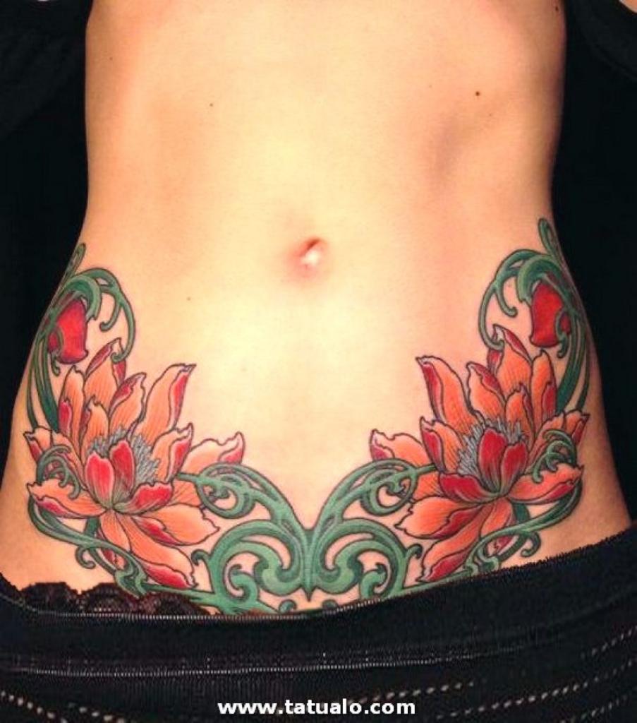 Tatuajes Abdomen Vientre Panza Barriga flores rojas en la parte baja