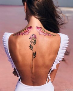 Tatuajes Arte Belleza Ideas Flor en columna y arreglo tipo alas en hombros