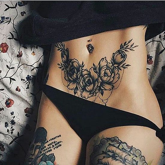 Tattoos Art Beauty Ideas Black flowers on belly