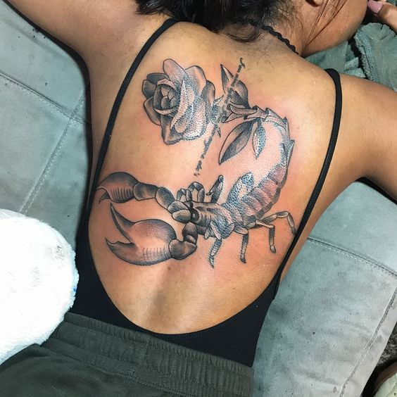 Tattoos Art Beauty Ideas Large scorpion and rose on the entire back plus inscription on the column
