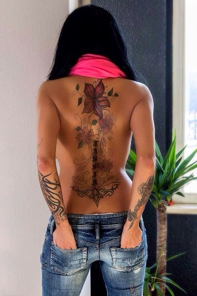 Tattoos Art Beauty Ideas Beautiful Motifs along the entire back Flowers branches and ornaments to the lower back