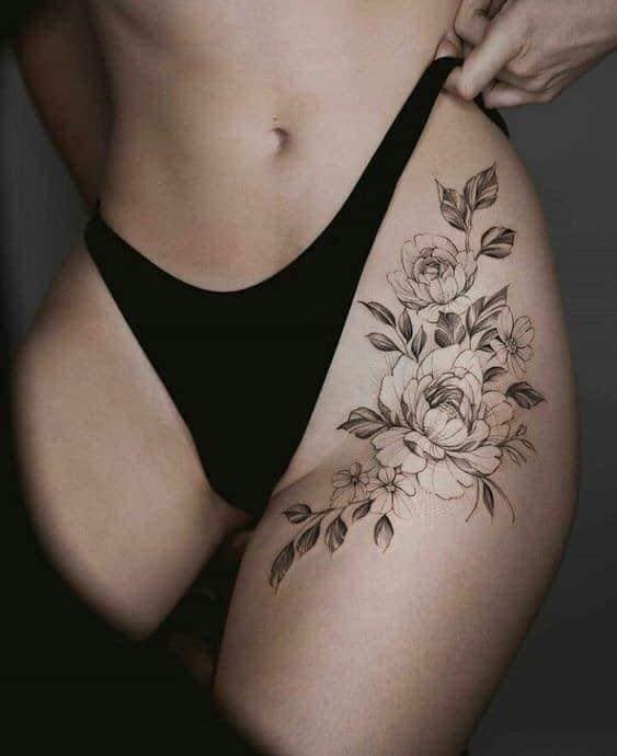 Beautiful and Sexy Tattoos for Women Large Rose Flowers on the Thigh