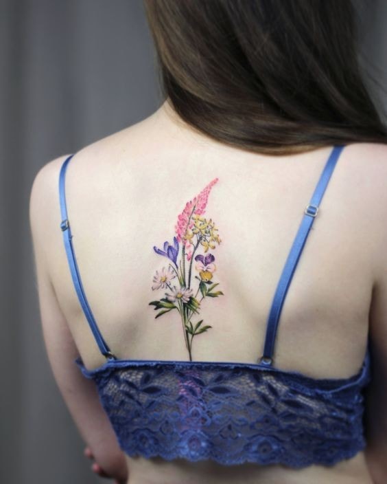 Tattoos Women Back Shoulder Blades Delicate Flowers to the middle of the back