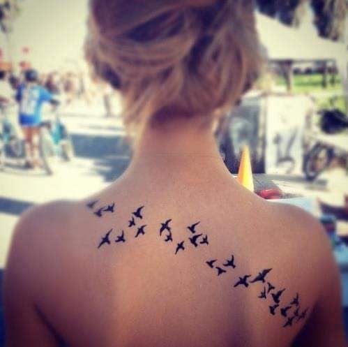 Really Beautiful Tattoos Women Birds Birds Seagulls crossing the back from one shoulder blade to the other
