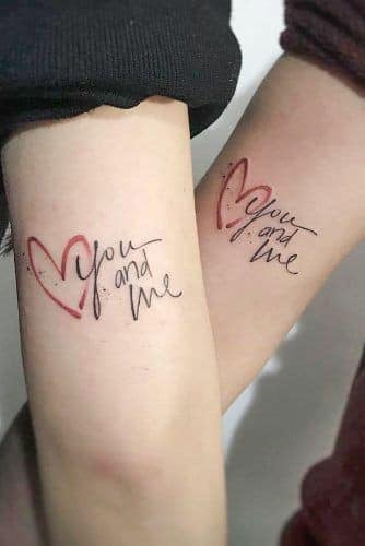 Really Beautiful Tattoos Women in couples with inscription You and Me You and Me