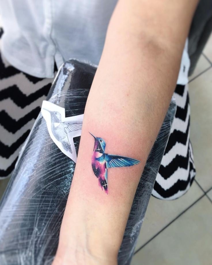 Hummingbird tattoos on forearm
