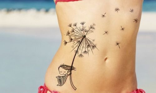 Dandelion tattoos on the abdomen with a large girl