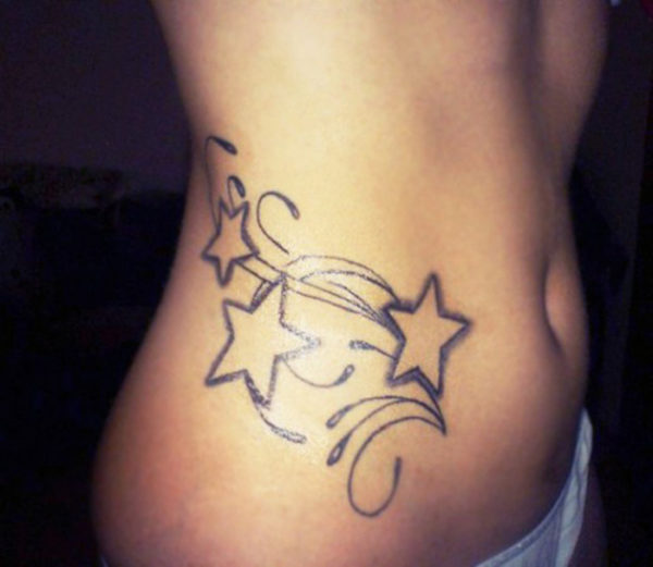 Star tattoos on the side of the belly