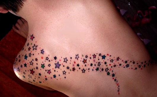 Star tattoos on the back on the shoulder and almost to the lower back of all colors