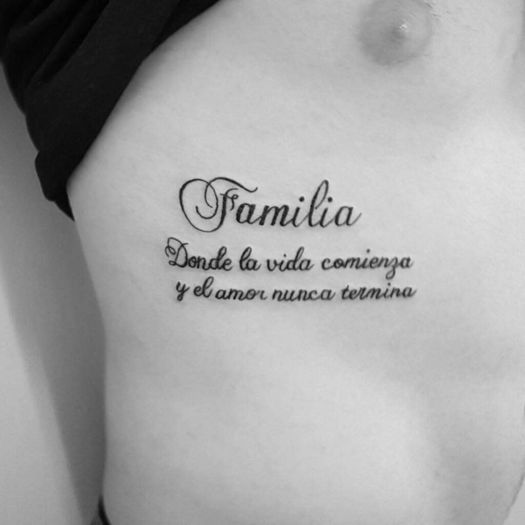 Family tattoos on the chest of a man inscription where life begins and love never ends