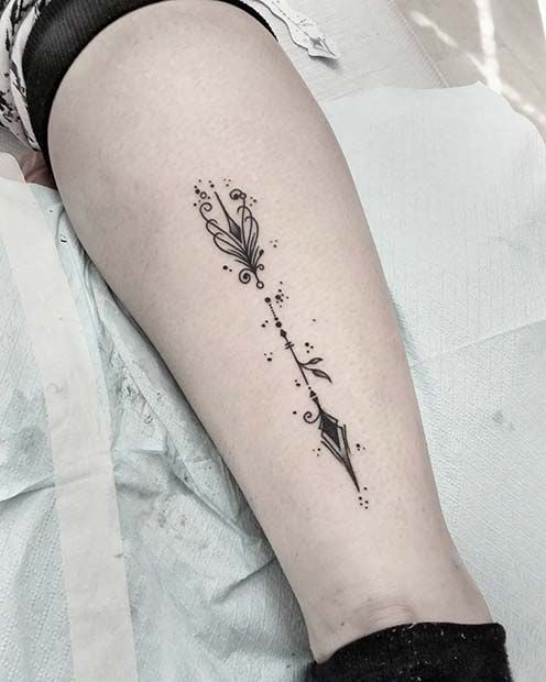 Arrow tattoos with ornaments and small geometric figures 35