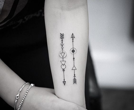 Arrow tattoos two arrows on forearm 38