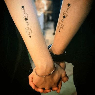 Arrow tattoos for couples with circles and triangles 29