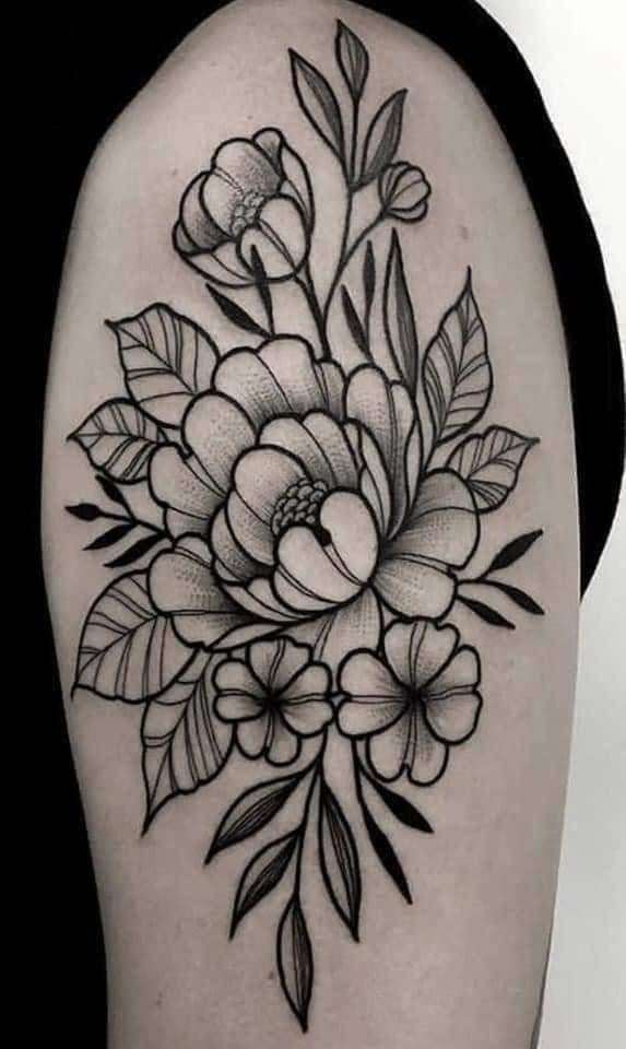 Schwarze Blumen-Tattoos, großes Blumenarrangement auf dem Arm