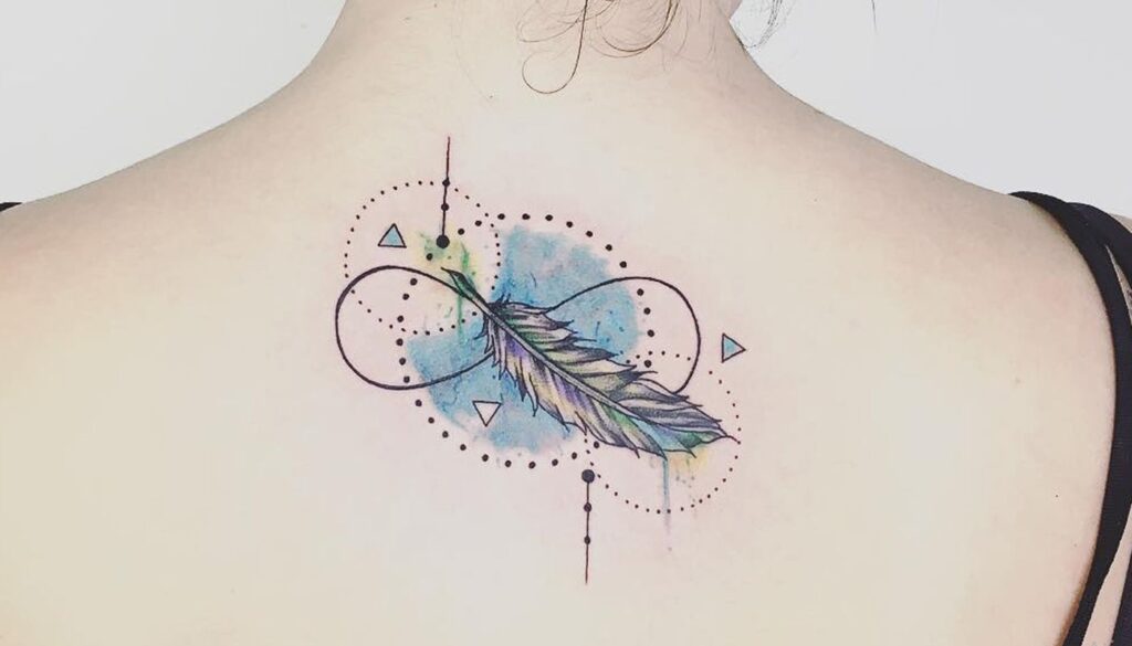 Infinity tattoos on back feather and circles