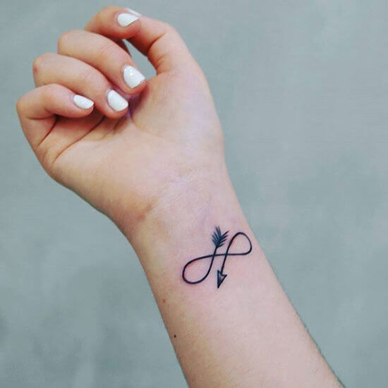 Infinity arrow type tattoos on wrist