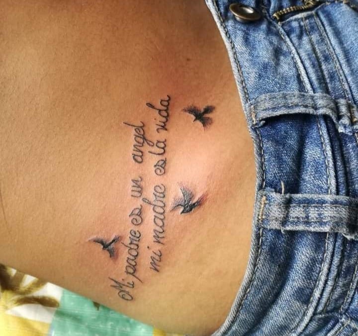 Tattoos of Mother and Children and family phrase my father is an angel my mother is life