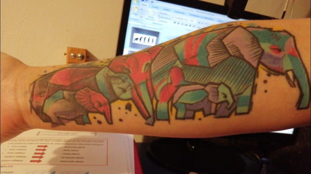 Tattoos from Mothers to Children five geometric elephants on forearm