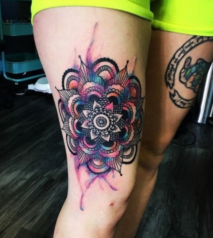Mandalas tattoos with red and blue spots