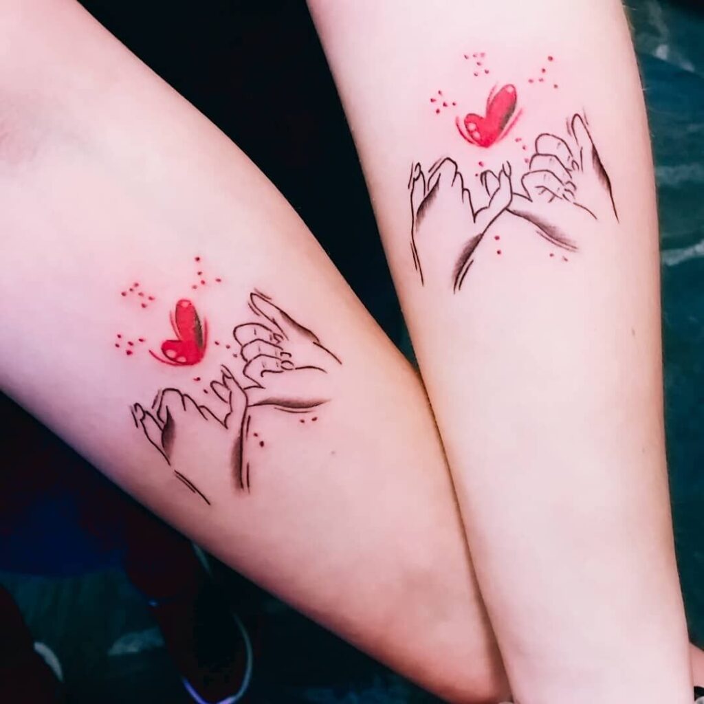 Match Tattoos for Friends Couples Sisters pinky fingers intertwined plus heart on forearms