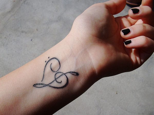 Heart Music Tattoos and Representation of Musical Notes on Wrist