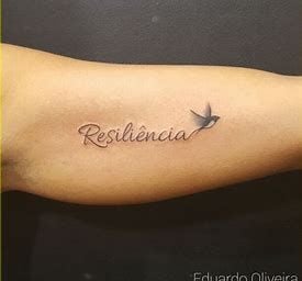 Tatuajes de Resiliencia con pajaro alzando vuelo