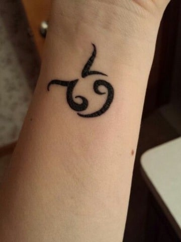 Chinese Taurus tattoos on wrist