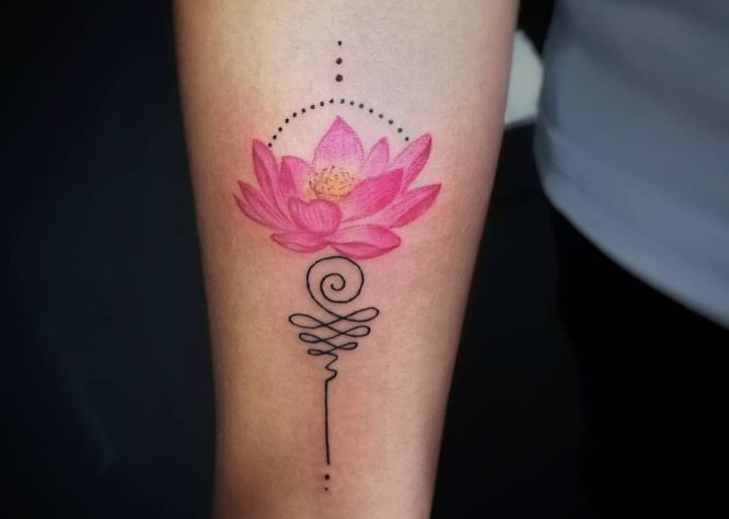 Unalome tattoos on forearm with pink lotus flower