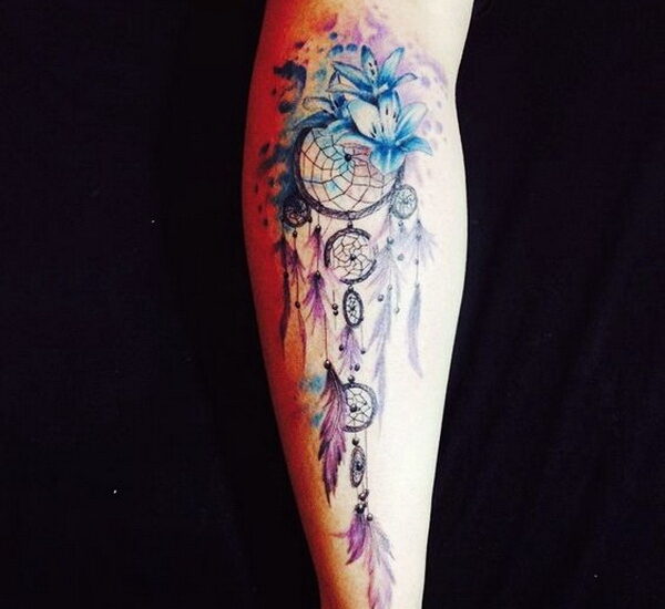 Angel caller dream catcher tattoos on forearm with various circles and feathers
