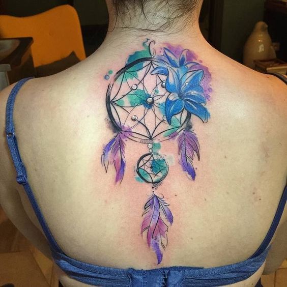 Dream catcher tattoos angel callers on back with violet tones blue flowers