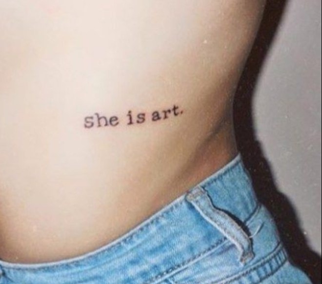 Tattoos of phrases she is art