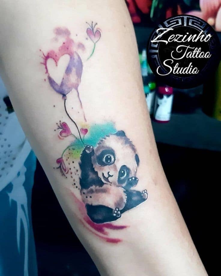 Tattoos of Panda bears with a balloon of hearts