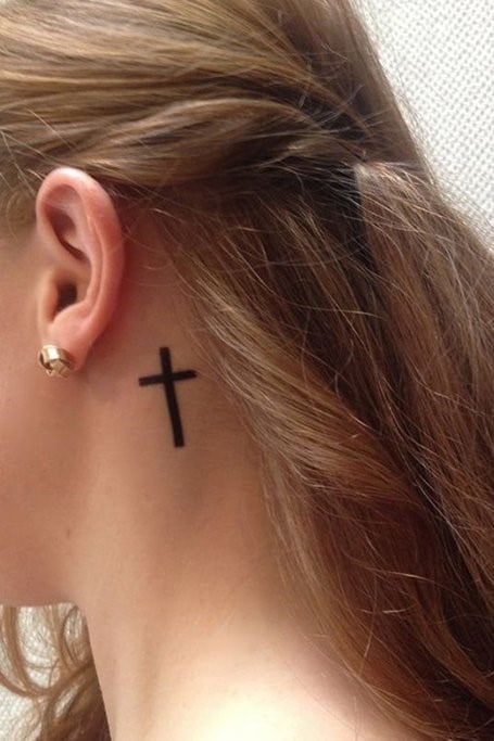 Tattoos behind under the ears Cross