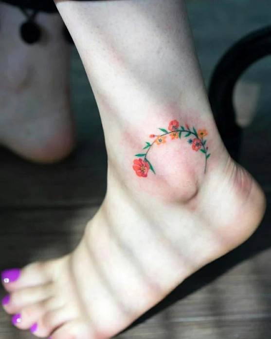 Tatuagens no tornozelo mulher multicolor galho de flores