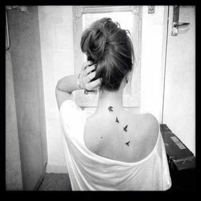 Tattoos on the Neck and Shoulder Blade birds flying towards the neck