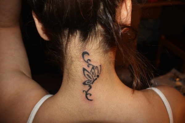 Tattoos on the nape of the neck butterfly and ornaments