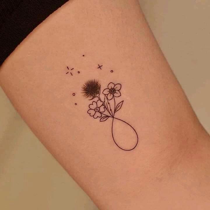 Petits tatouages minimalistes à l'infini avec des fleurs Fleur de chardon et des étoiles 1