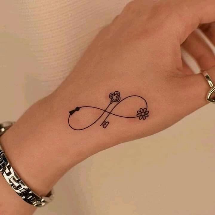 Small minimalist infinity tattoos with lock key and flower
