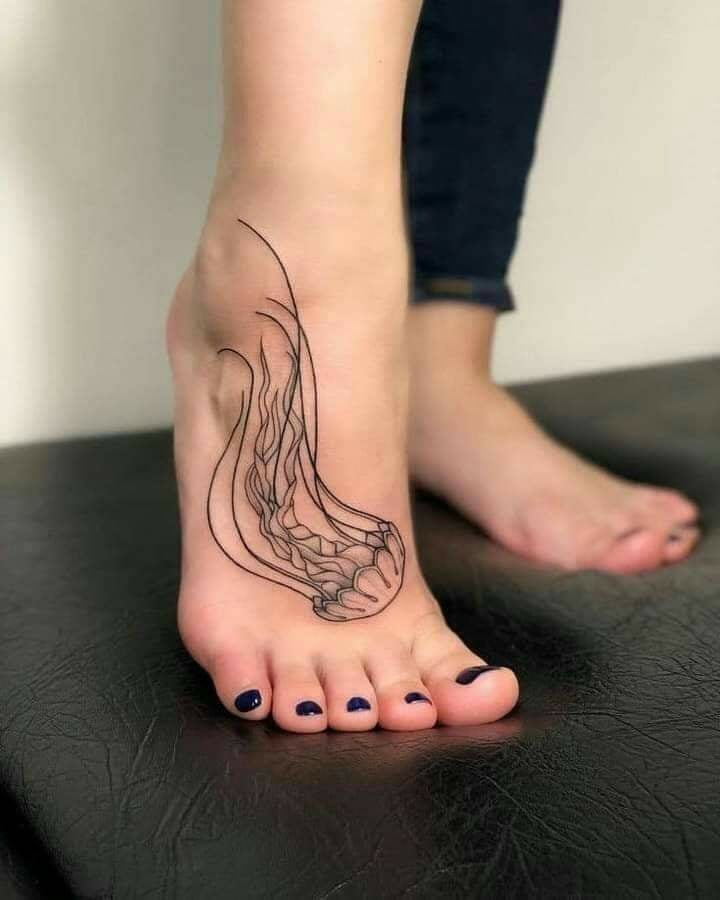 tattoos for women jellyfish on foot