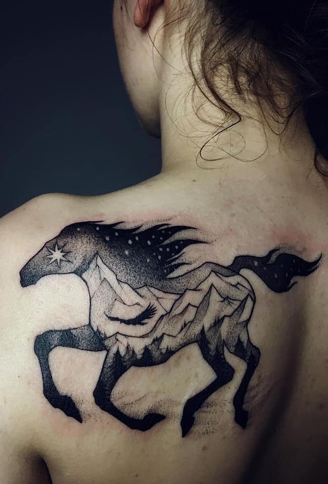 Tattoos for Women Black horse with landscape inside
