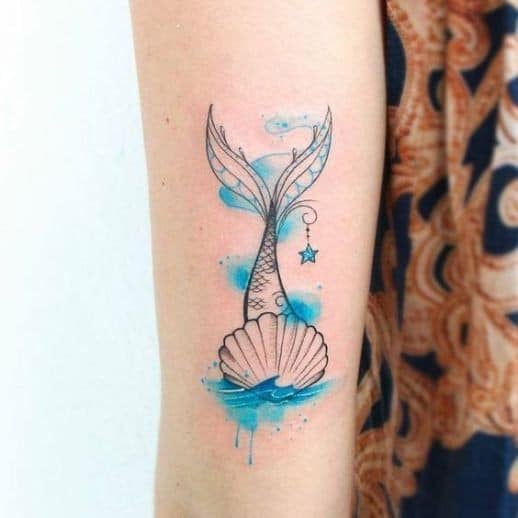 Tatuajes para mujeres sirena estrella y concha de mar
