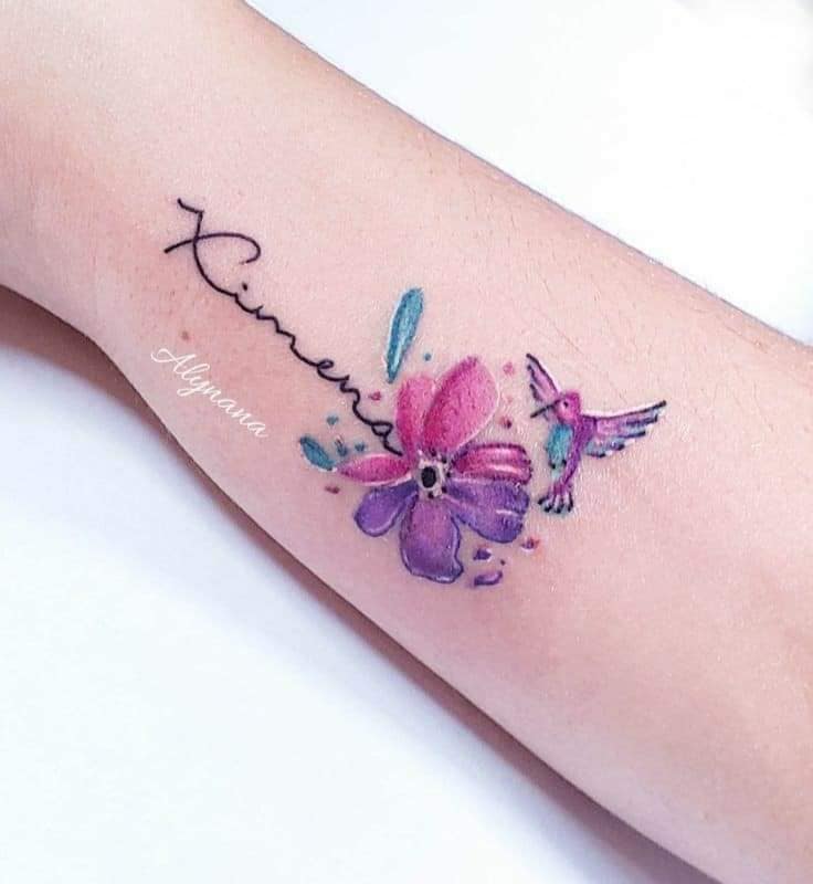 Really beautiful flower tattoos on wrist with hummingbird and the name Ximena