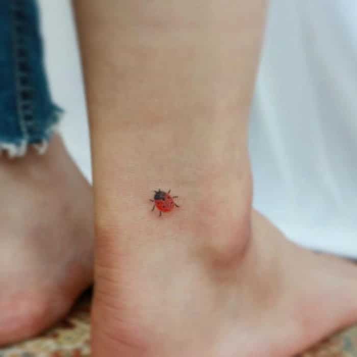Super small ladybug tattoos for women on calf