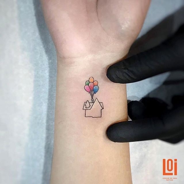 house tattoo with balloons