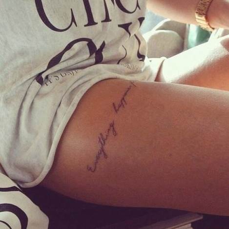 Tattoo of a woman in the area of the small leg, handwritten inscription