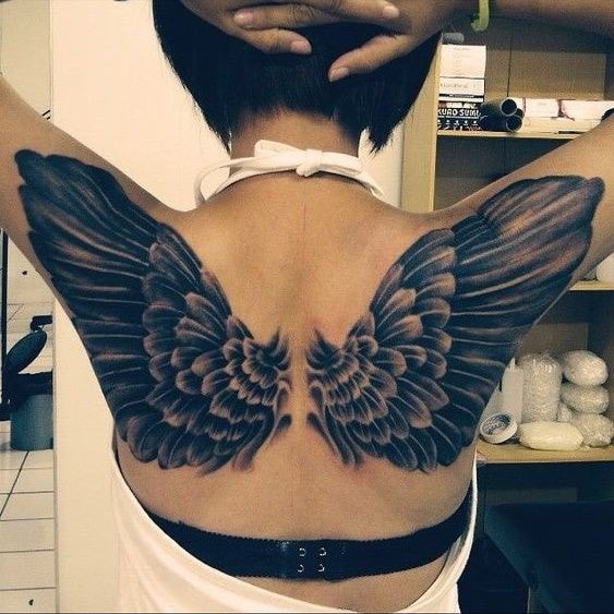 full back tattoo woman black angel wings